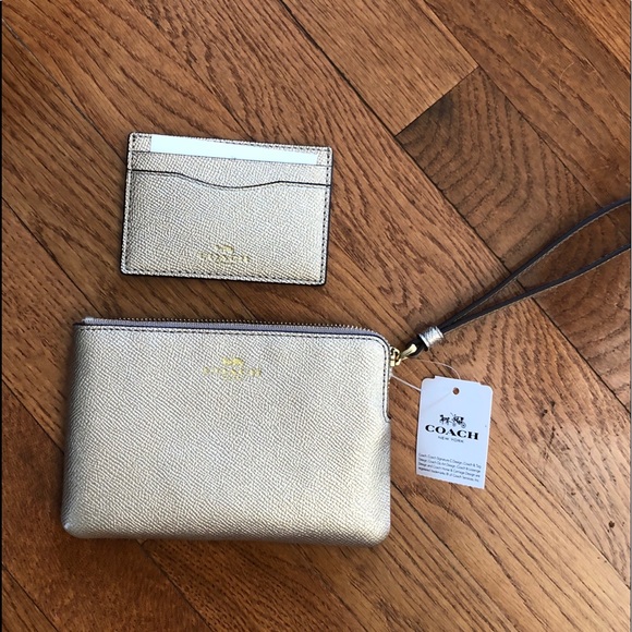 Coach platinum Leather Wristlet with I.D.Card. - Picture 1 of 3